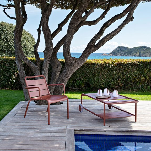 Fermob Luxembourg Lounge armchair and low trolley in Red Ochre