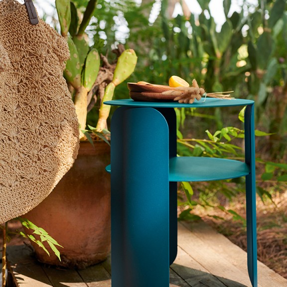 Fermob bebop blue side table 35cm sitting outdoors