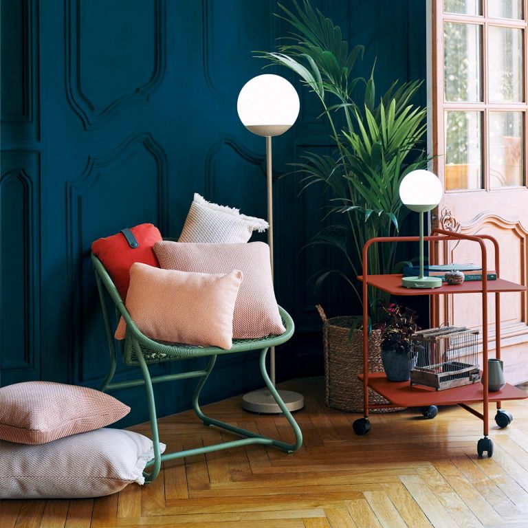 Fermob Sixties armchair in Cactus with Mooon! lamps and Alfred trolley in Red Ocre