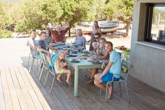 Fermob Ribambelle long outdoor dining table seats 12 with Fermob Luxembourg chairs